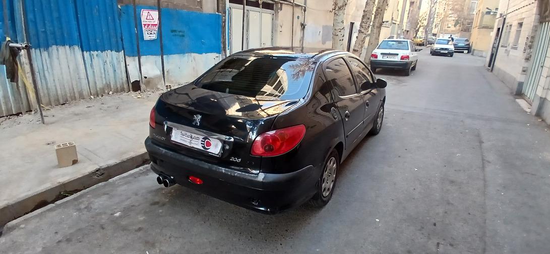 تصویر پژو 206 صندوقدار مدل 1394 ا V8 V8