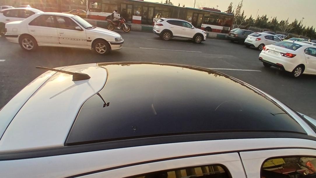 تصویر پژو 207 مدل 1400 ا دنده ای سقف شیشه ای دنده ای سقف شیشه ای